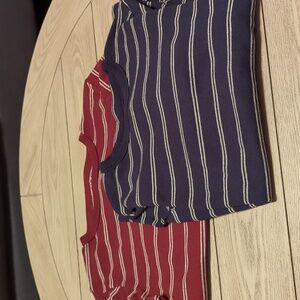 Two long sleeve Henley shirts